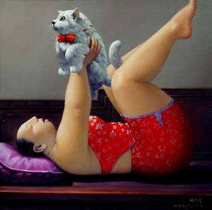 woman laying down with cat
